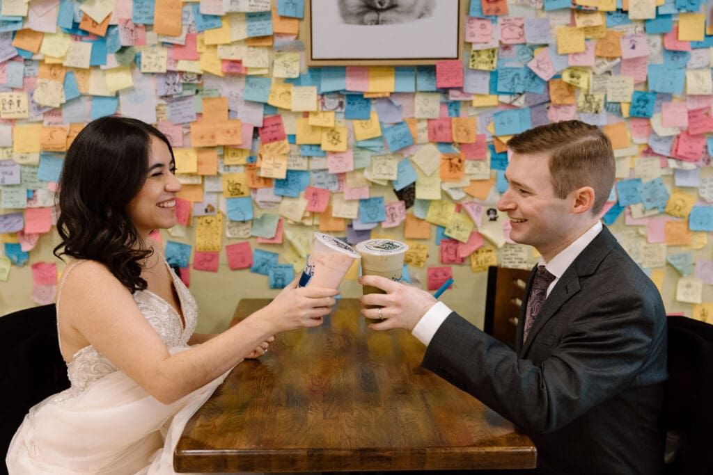 Couple toasting with bubble tea.
