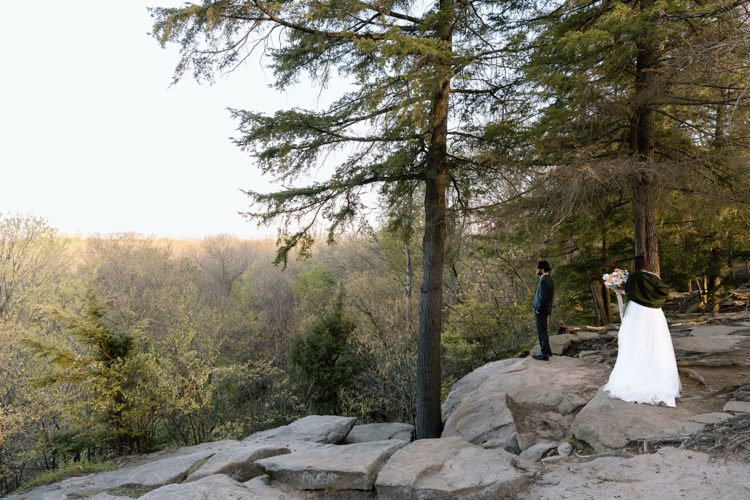 Bride walking up to groom on the overlook at Cuyahoga Valley National Park