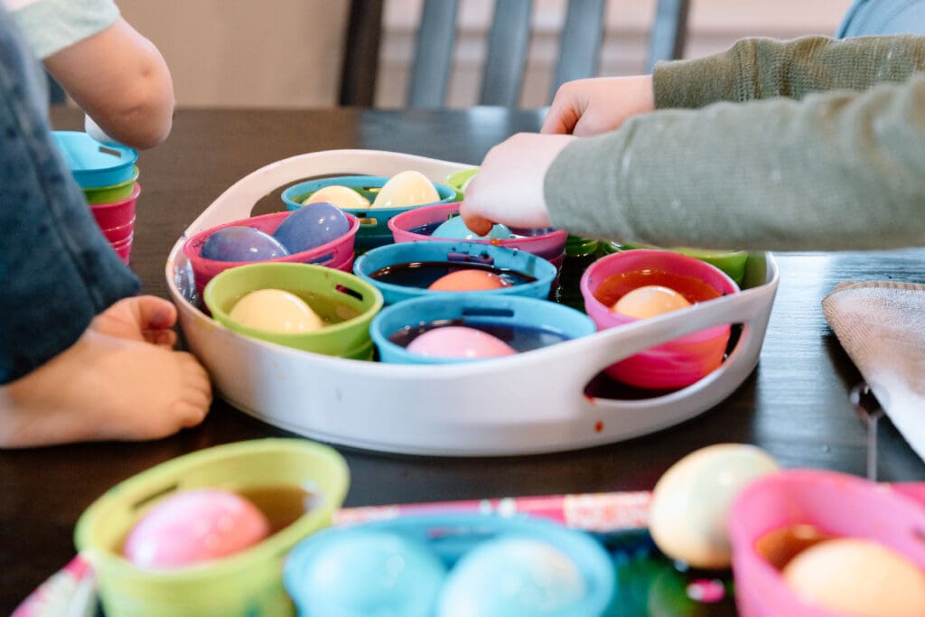 Children decorating Easter eggs.