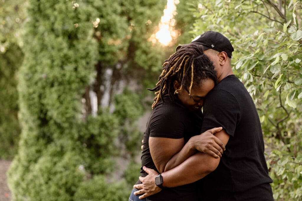 Couple embracing.