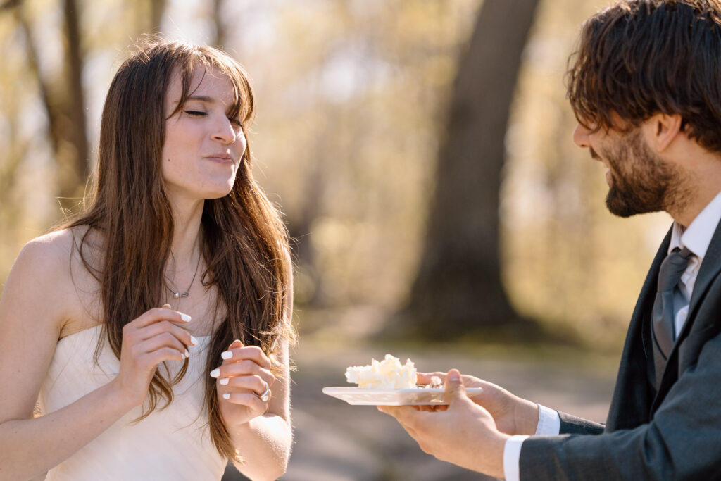 Bride enjoying cake during an Ohio elopement.