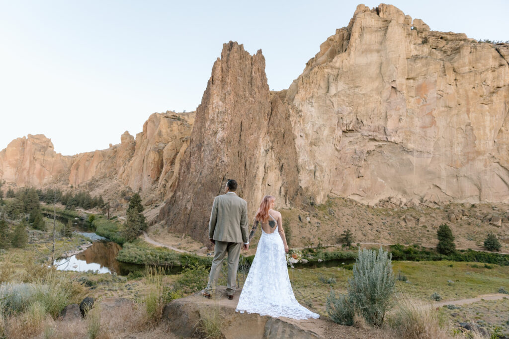 Couple standing in Smith Rock State Park in Oregon.