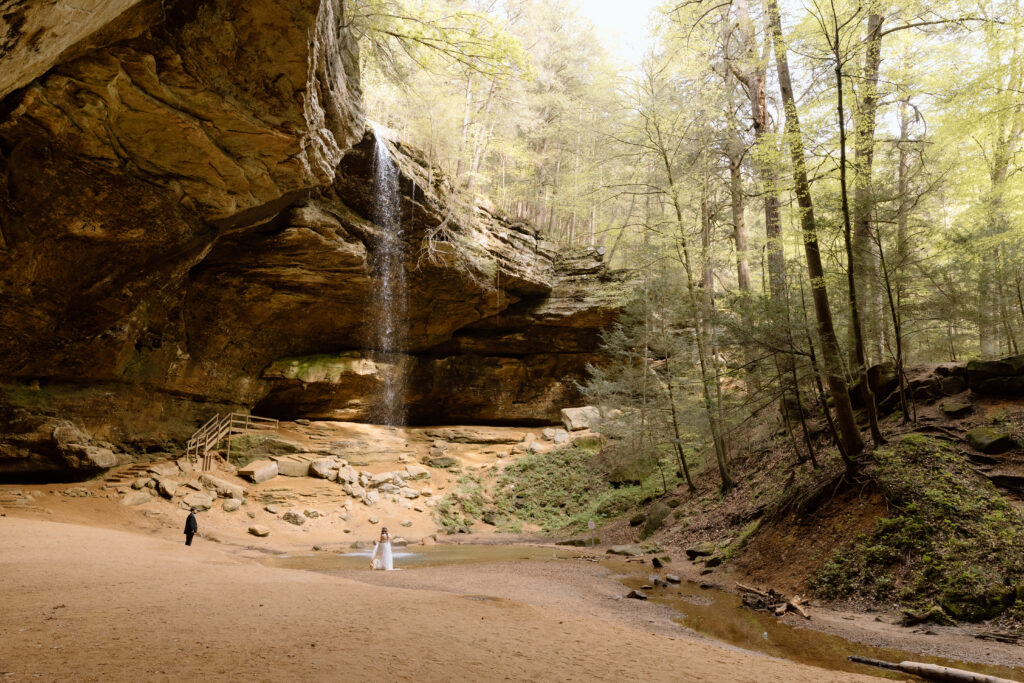 Couple near waterfall in Ash Cave.