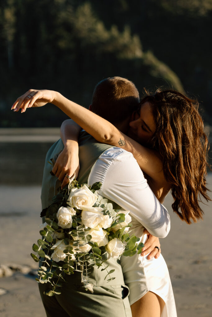 Bride and groom hugging