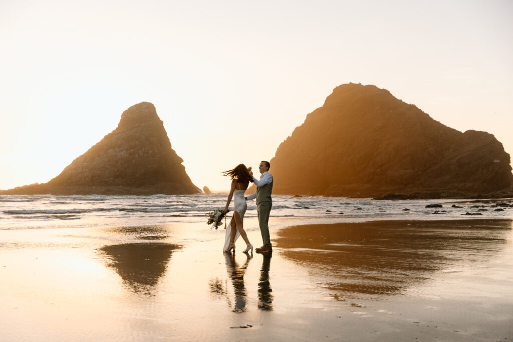 Bride spinning as groom twirls her.