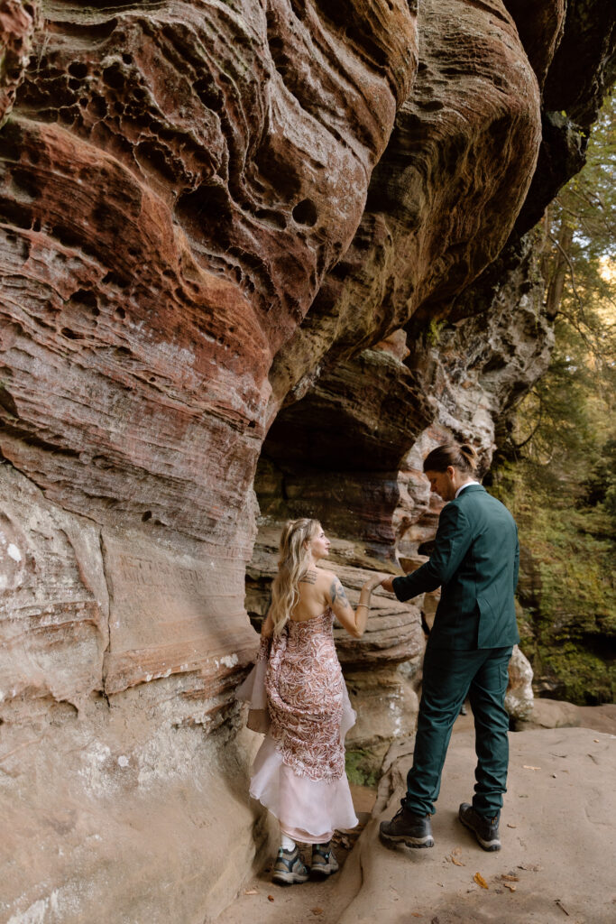 Couple outside Rock House cave.