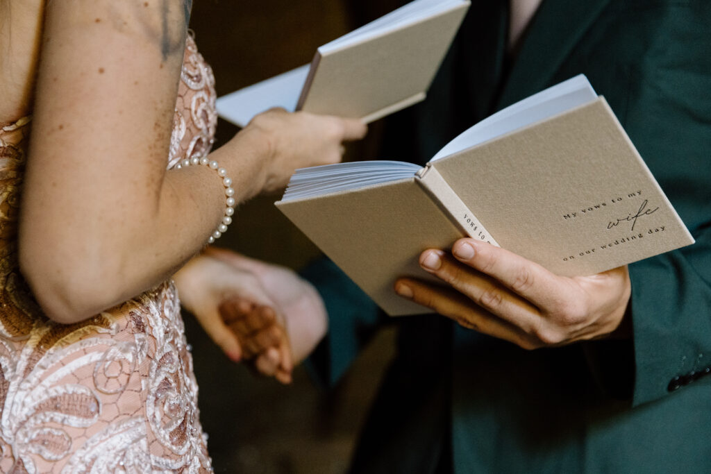 Close up of vow books. 