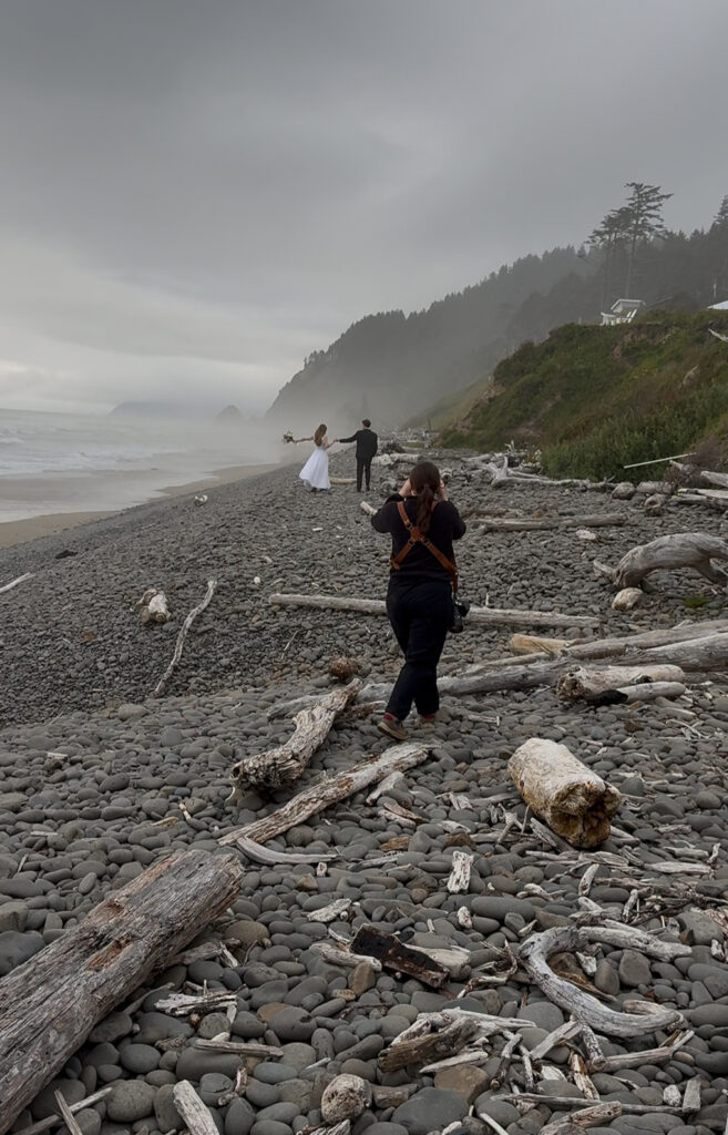 Desiree photographing a couple on the Oregon Coast.