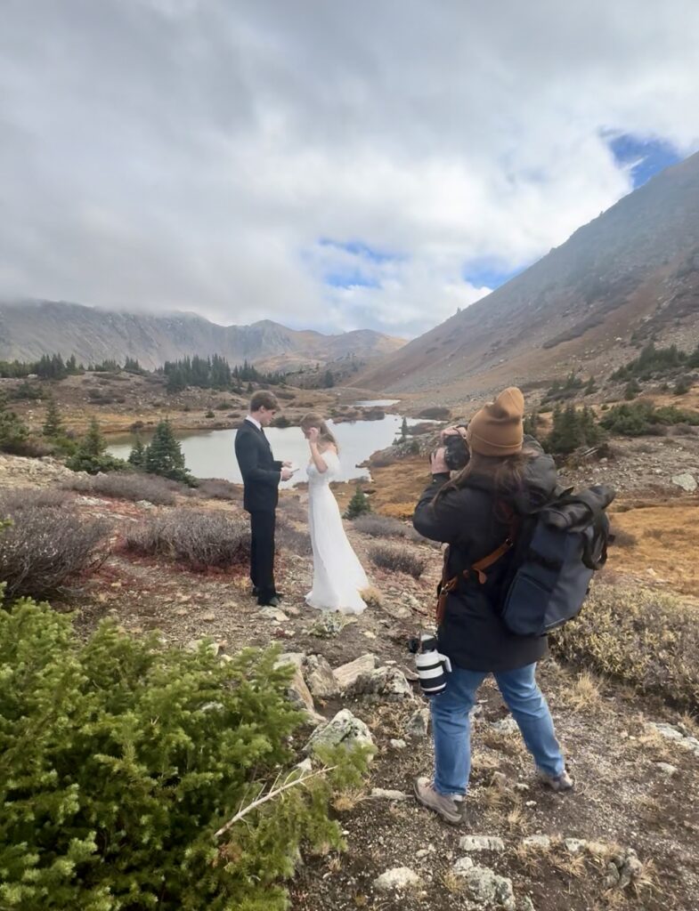 Desiree photographing an eloping couple in Colorado.