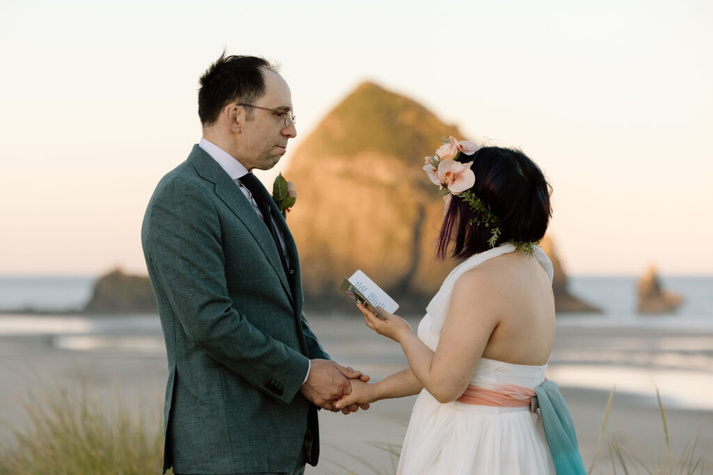 Couple saying their vows at Cannon Beach.