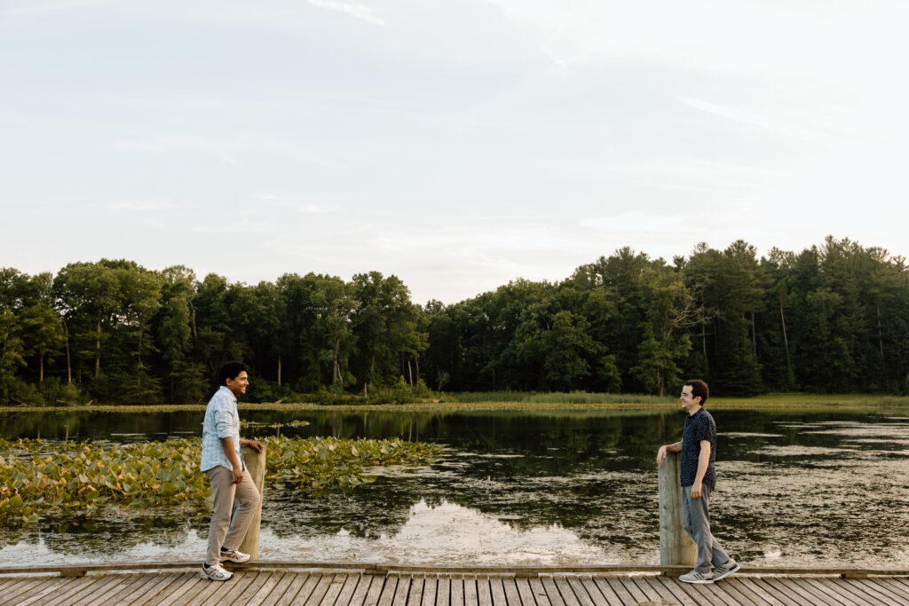 Couple standing across from one another at Kendall Lake.