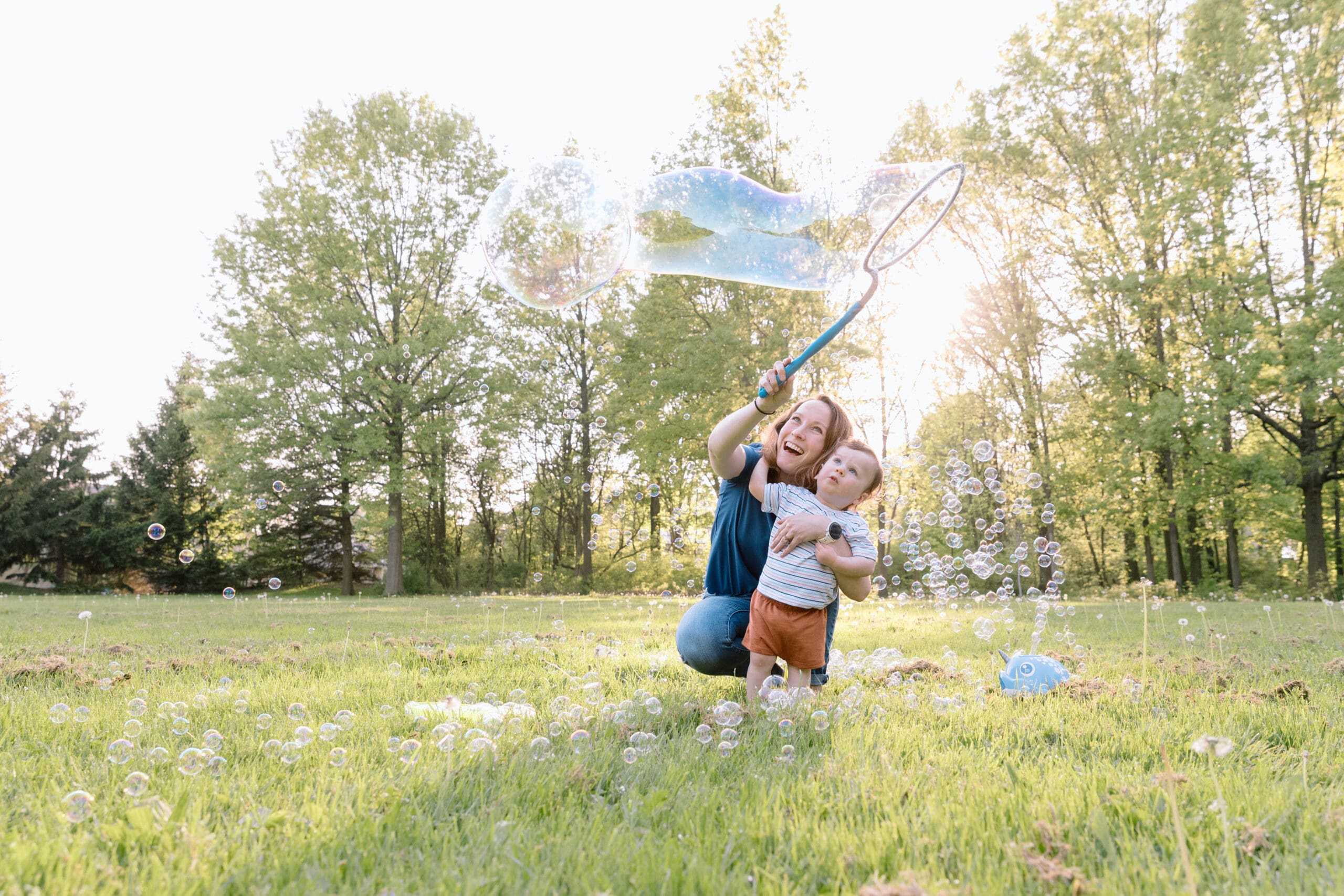 Mother and son playing with bubbles